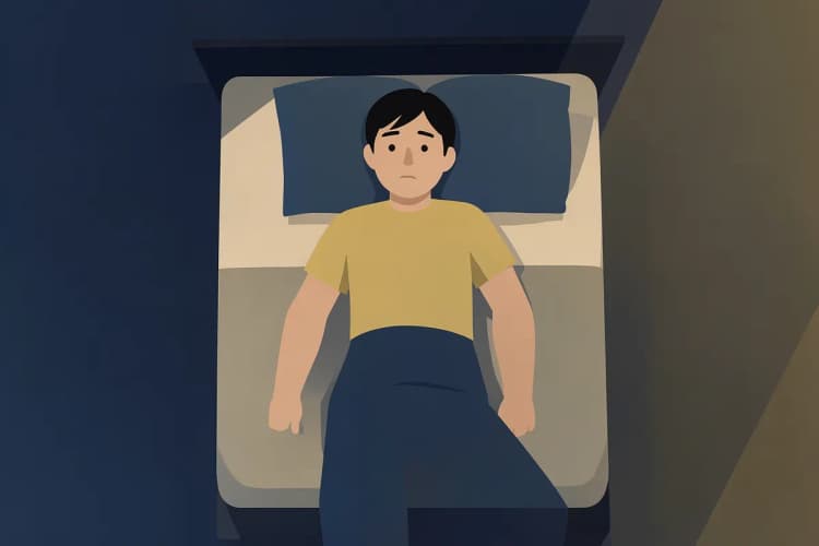 Pessoa deitada na cama com olhar vago